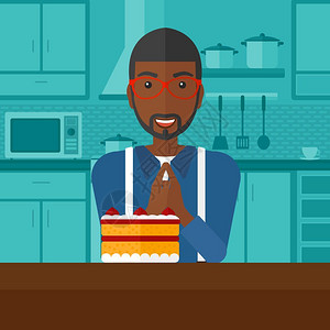 站在厨房蛋糕前许愿的非裔男子图片