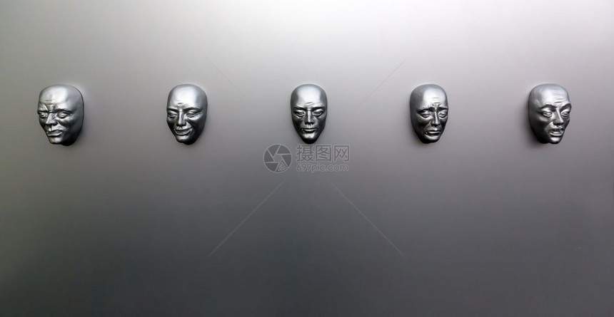 人的不同情感墙上的雕塑面罩正观情感概念面模型人的情感雕塑面罩图片