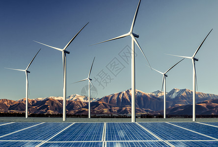 太阳能电池板光伏和风力涡轮机农业发电在自然景观中生产可再绿色能源是友好型工业背景图片