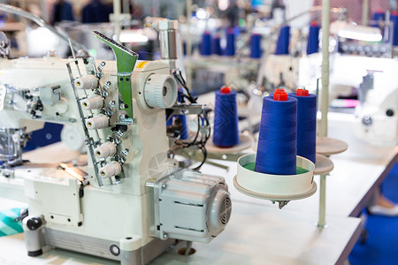 缝纫机布无人服装厂织物生产缝纫技术布无任何人背景图片