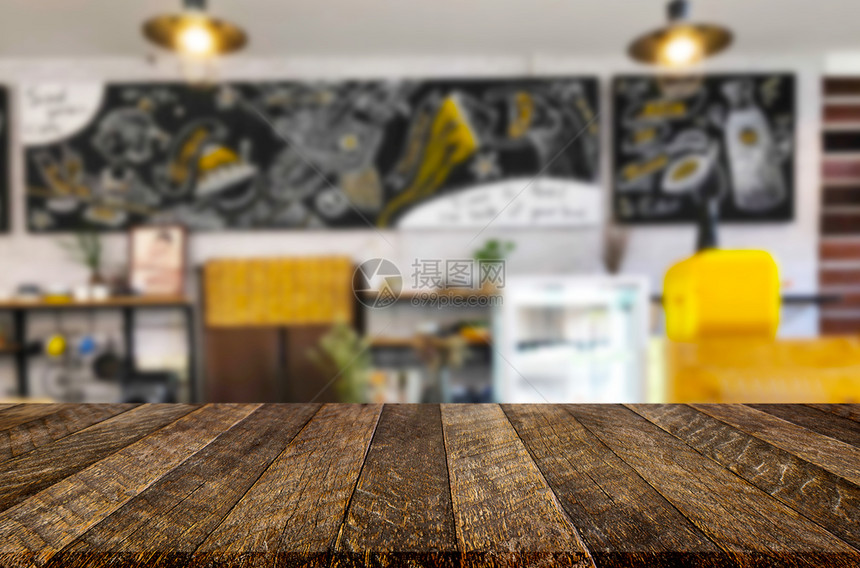 棕色的木制桌和餐馆背景图片