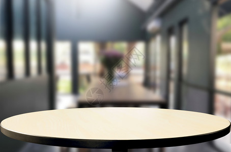 空的白色圆桌和变模糊的背景背景图片