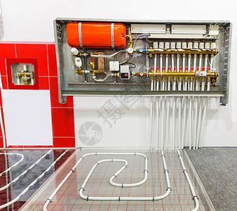 台积电一套装有采集器的供暖楼层系统背景