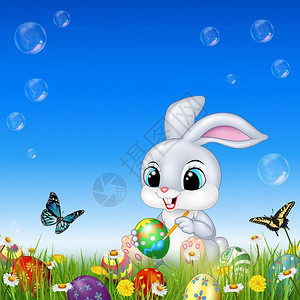 装饰东方鸡蛋的卡通兔子夏天高清图片素材
