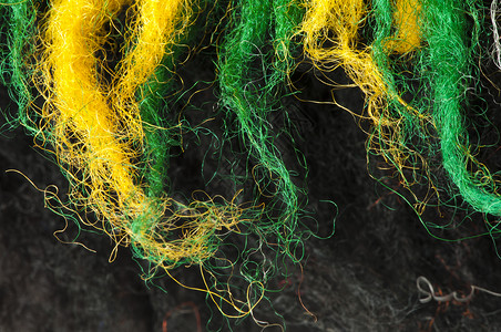 绿色和黄羊毛纤维的缝合图片
