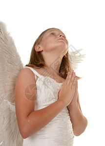 年轻天使女孩祈祷孤立在白上祈祷图片