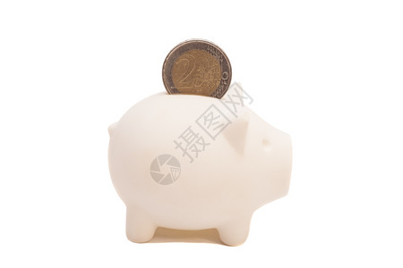 带欧元硬币的猪银行图片