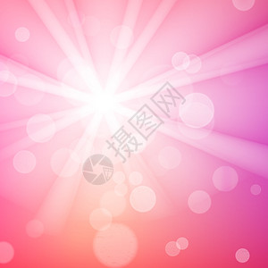 粉红色模糊背景上的抽象bokh火花图片