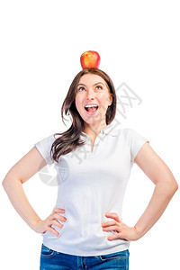 长着苹果的笑女孩头顶着苹果白色背景的脸图片