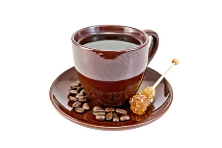 咖啡加棕色杯在白背景上隔绝的碟子加晶糖图片