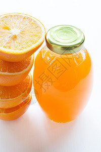 新鲜橙汁加白的健康维他命饮料图片