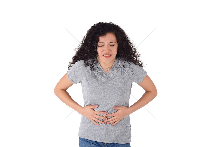 美丽的年轻拉丁女人胃痛孤立的白种背景图片