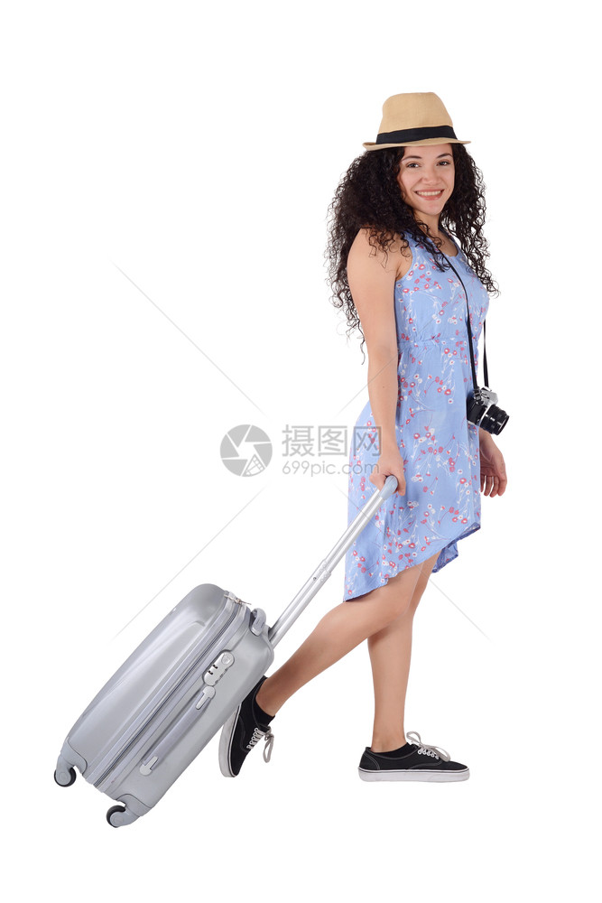 美女带着手提箱去度假旅行图片