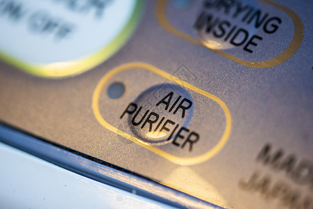 空气净化和脱湿清洁空气和脱湿的概念净化装置上的按钮灰尘净化图片