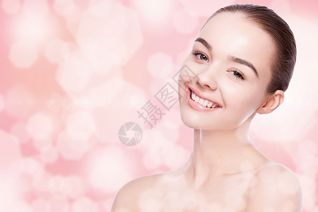 美丽的女可爱笑容美丽人天然化妆品SPA皮肤护理肖像背景图片