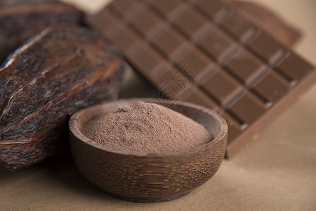 可可豆和巧克力棒甜点背景图片