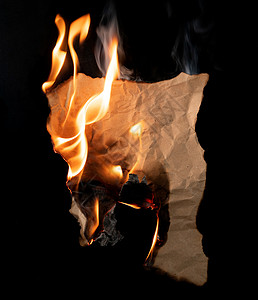 纸火黑色背景上烧焦的折叠纸背景