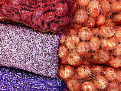 蔬菜批发市场用于批发市场的彩色网袋农业产品工背景