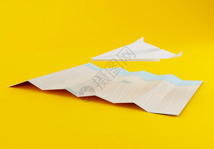 黄色背景的折叠纸飞机图片