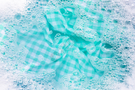 在粉末洗涤水溶解中浸泡蓝色高清图片素材