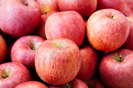 福果新鲜的粉红福吉苹果农贸市场收时水果季节堆积的奥莫里环果背景