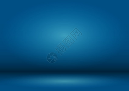 空白蓝工作室背景与vignet蓝色背景由光源照亮图片