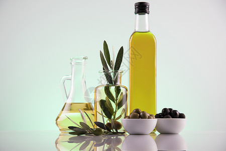 橄榄油枝和食用油背景图片