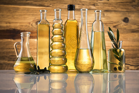 橄榄油枝和食用油背景图片