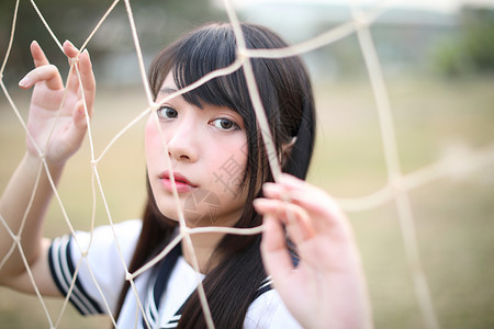 美的亚裔高中女学生制服肖像图片