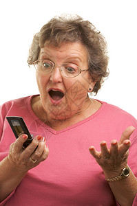 使用手机的老年妇女电话高清图片素材