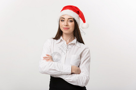 头戴圣诞帽的女商人背景图片