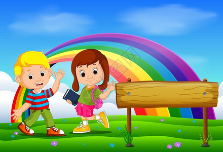 彩虹天空公园里可爱的女孩和男孩图片