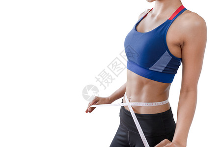 妇女带着色度并试图测量腰部以便用白色背景隔离的脂肪检查图片