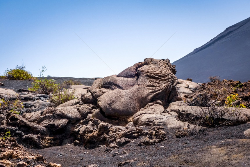 岩浆流的细节火山斗篷动脉非洲岩浆流的细节雾图片