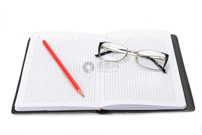 笔记本电脑眼镜白背景上的笔图片