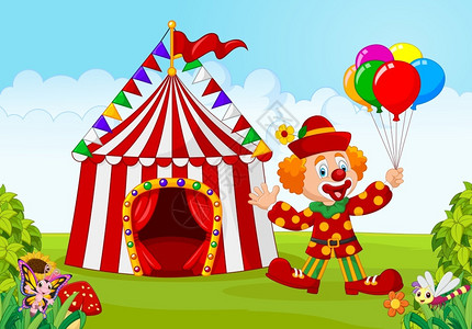 马戏团帐篷小丑拿着气球在公园图片