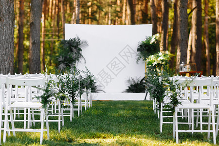 美丽的婚礼设置仪式的区域可爱流行生动装饰品节日的一部分花岗的布置模糊背景选择焦点婚礼场所可爱花卉布置背景图片