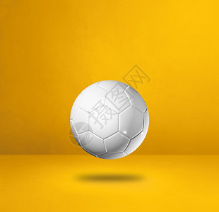 以黄色工作室背景孤立的白色足球3D插图黄色工作室背景的白色足球图片