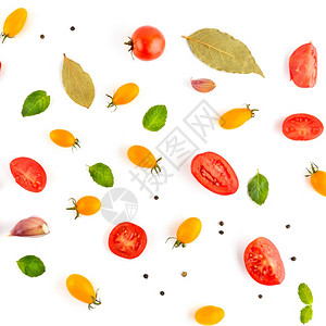 来自樱桃番茄大蒜胡椒和海湾叶的明亮背景白色的蔬菜图片