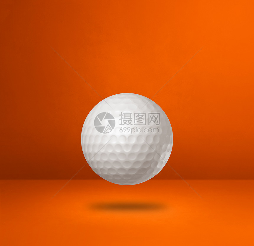 以橙色工作室背景孤立的白色高尔夫球3D插图橙色工作室背景的白色高尔夫球图片