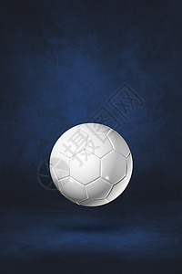 以深蓝色工作室背景孤立的白足球3D插图深蓝色工作室背景的白足球图片