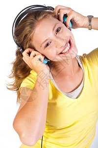 迷人的女孩享受音乐DJ耳机生活方式高清图片素材