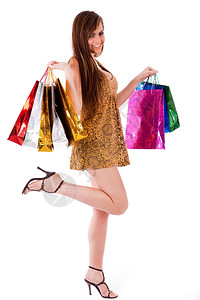 白孤立背景的黑发女孩带着购物袋携带高清图片素材