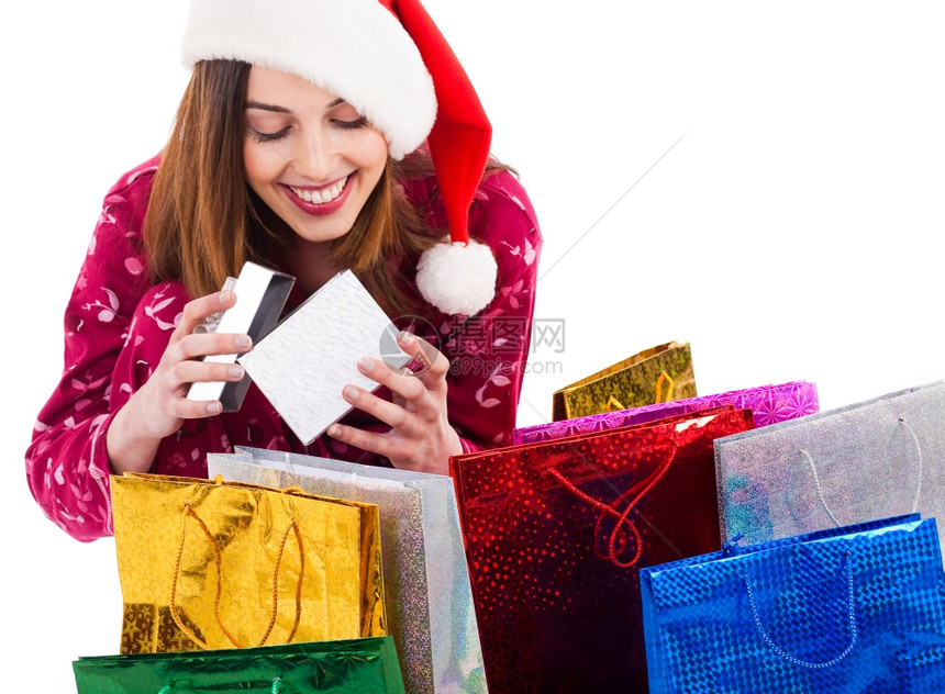 圣诞女孩打开礼物盒白色背景的图片