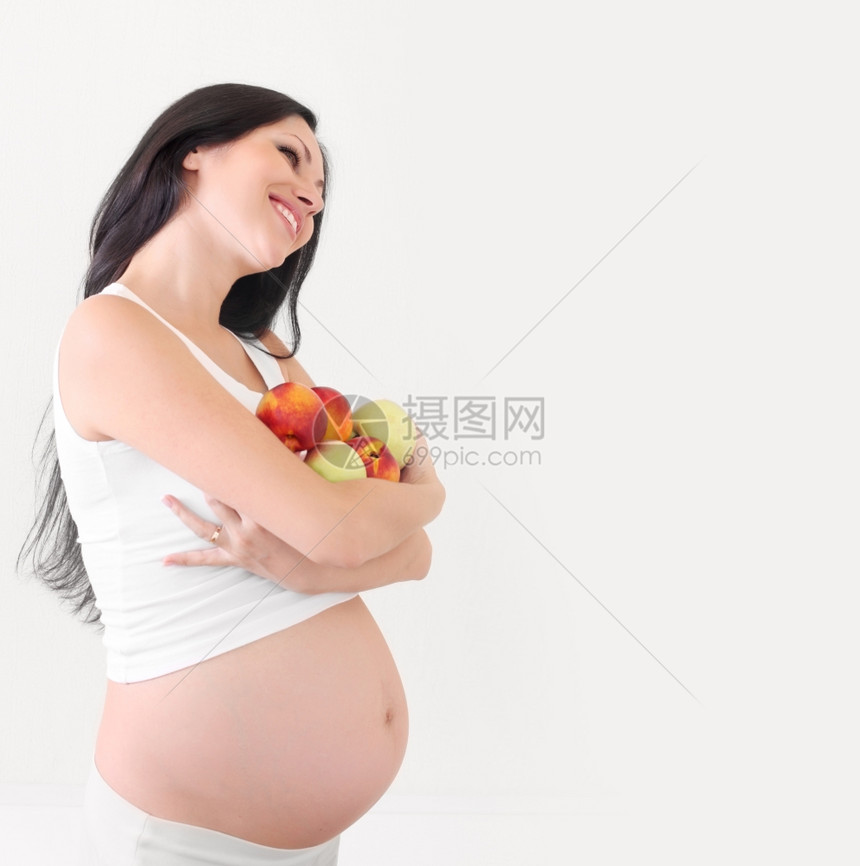 抱着水果的孕妇图片