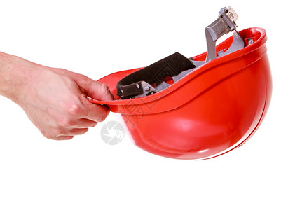 建筑工人长手里的红色硬帽被白隔离在上工业作安全室中网站高清图片素材