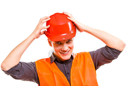 建筑工人长穿着橙色安全背心戴着红色硬帽孤立在白色上工业作安全室中帽子高清图片素材