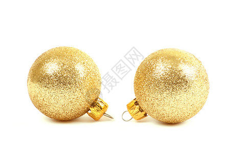 金色闪耀圣诞球两个金色的圣诞球背景
