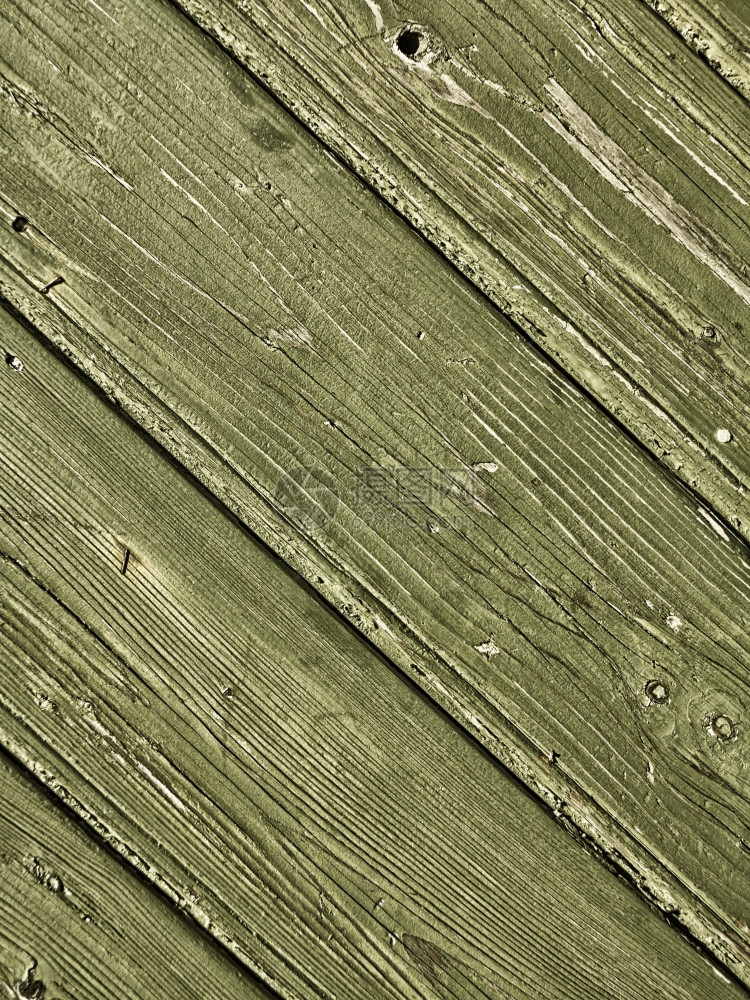 天然木板或老旧纹理的厚绿色背景图片