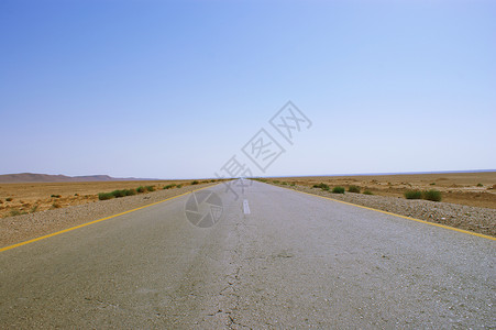 一片石荒沙漠和道路图片